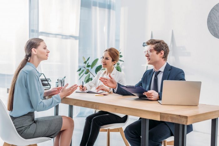 workplace meeting to discuss upskilling and learning